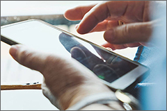 Close up of older woman checking her phone